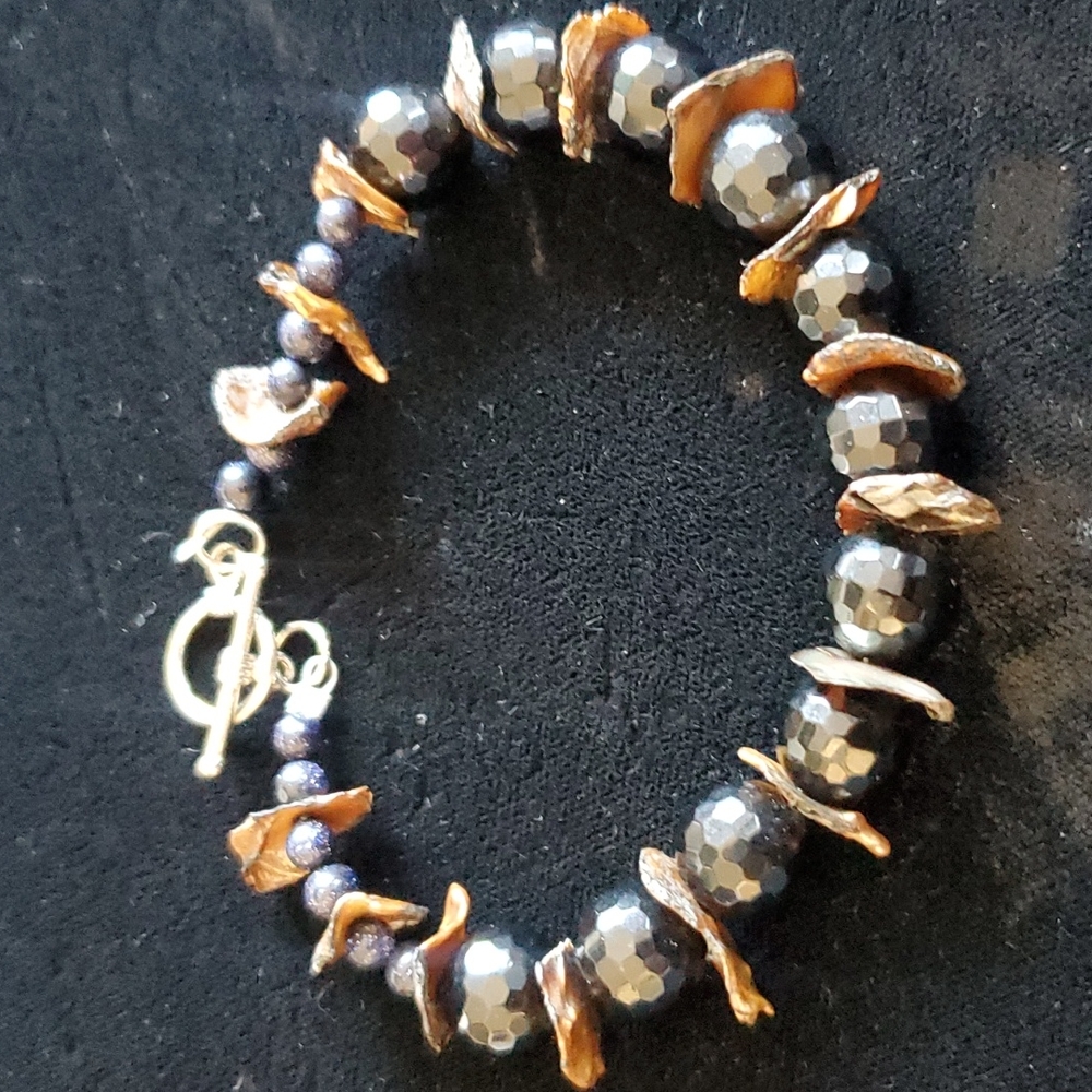 One-of-a-kind, glass and corn flake pearl
